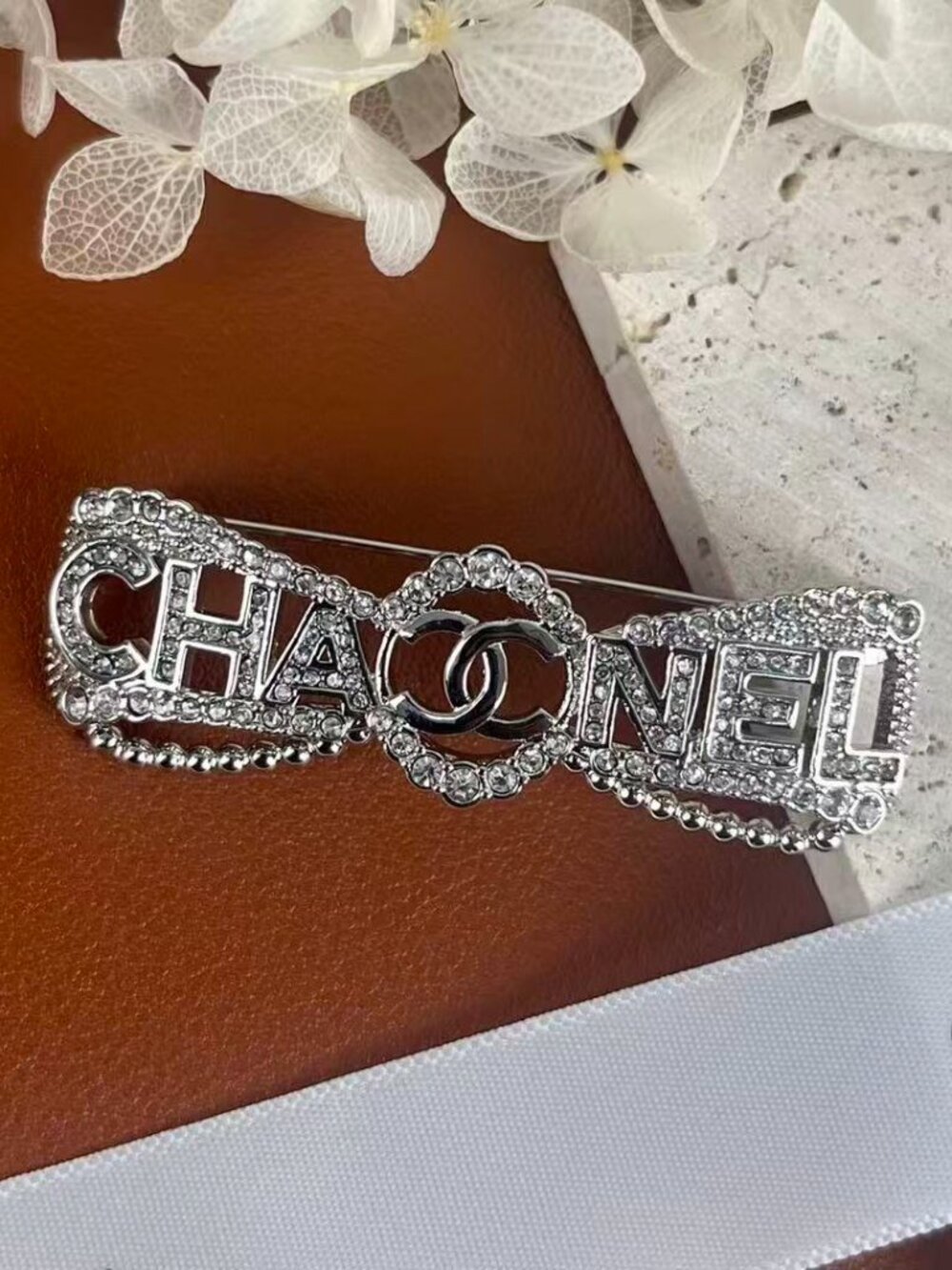 Like-New Chanel Crystal "CHANEL" Logo Brooch